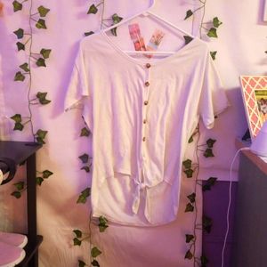 White tee with boho buttons